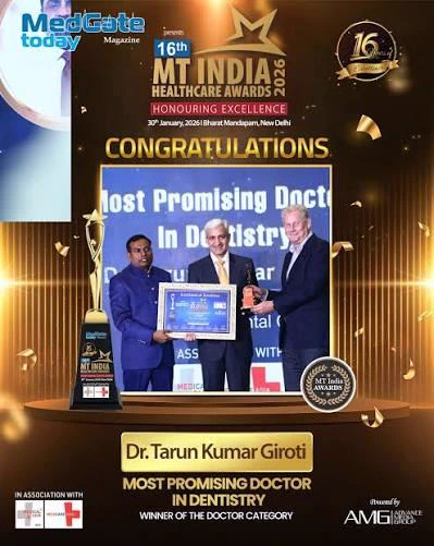 Dr. Tarun Kumar Giroti receiving the Most Promising Doctor in Dentistry award, MT India Healthcare Awards 2026